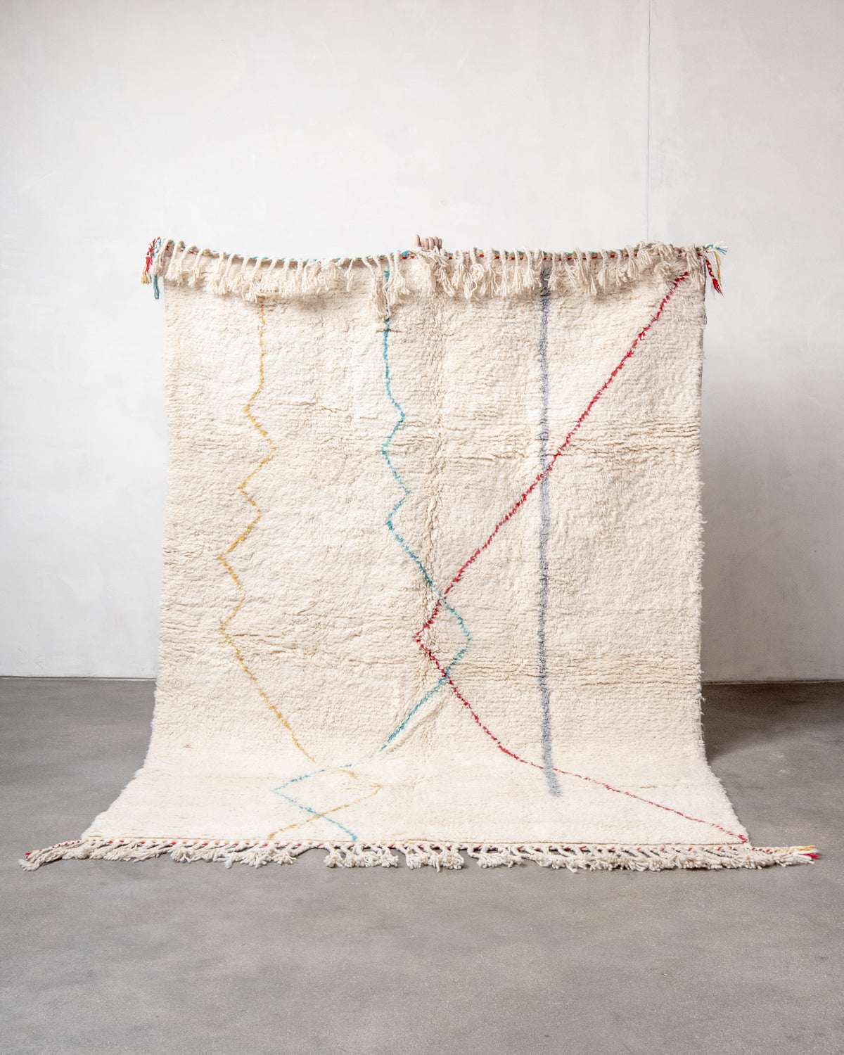 Modern, designer, handcrafted Berber rug from Morocco. Beniourain carpet with beautiful colours and patterns and fluffy wool texture.